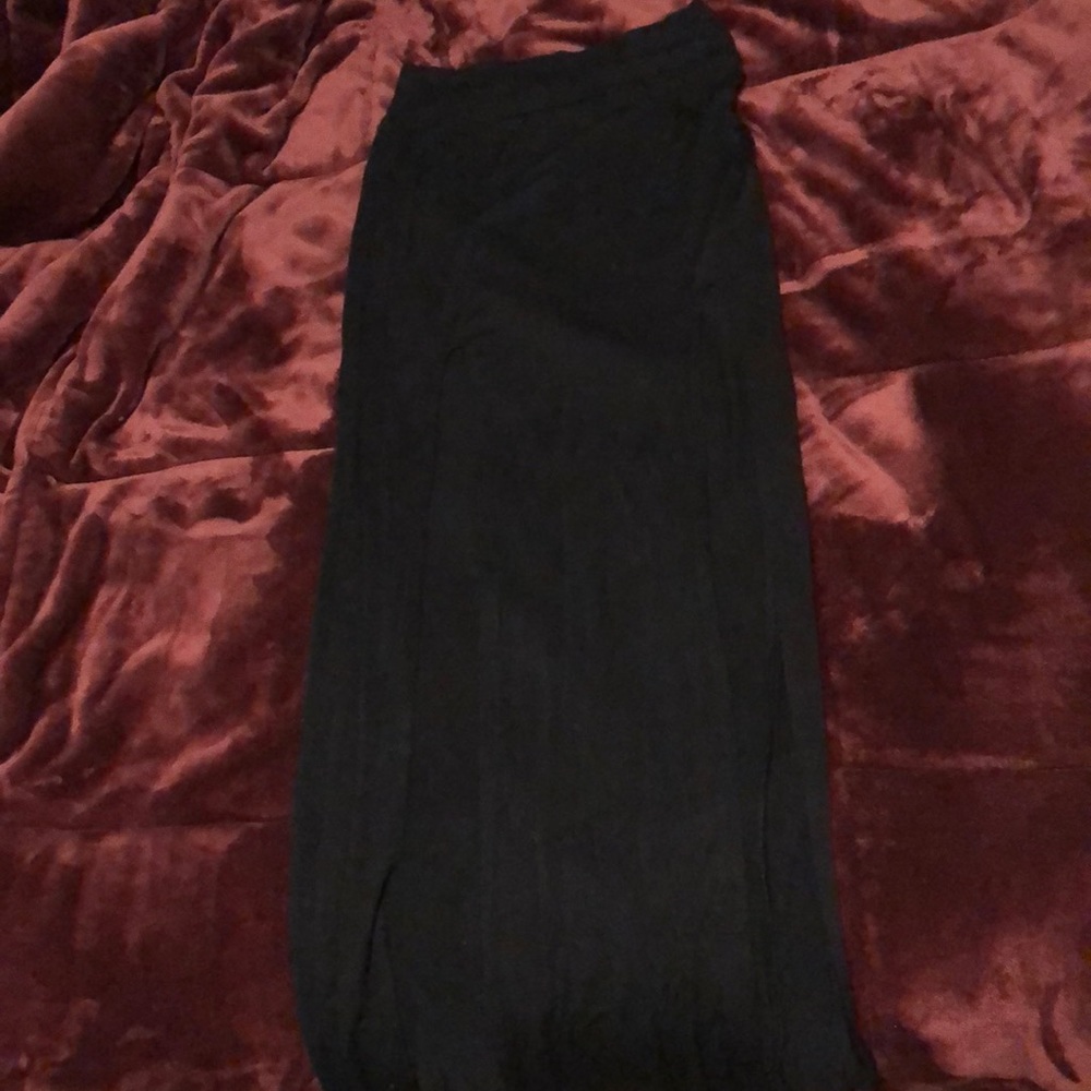 Black maxi skirt with two slits in front.
